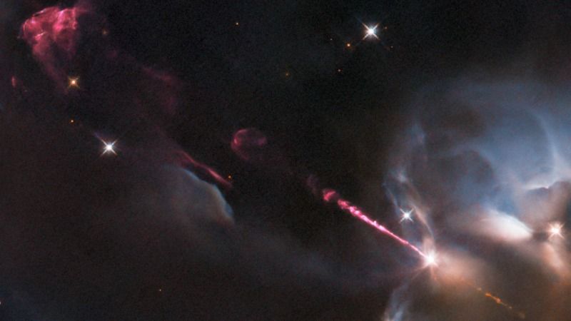Hubble telescope captures spectacular laser-like jet from infant star (photo) - Space.com