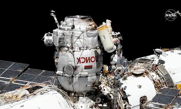 Two cosmonauts carry out the first spacewalk of 2022 TODAY - Daily Mail