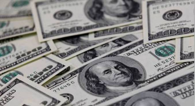 Dólar tem maior queda semanal desde novembro com ajuste global - R7